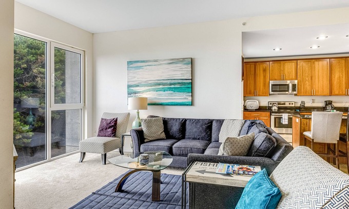 Rockaway Beach Condo | Oceanfront condo with mountain view, beach access, balcony, and washer/dryer - dog-friendly