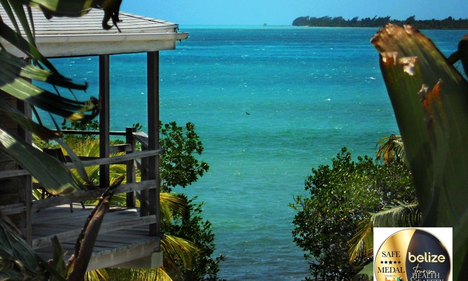 Caye Caulker Villa | OCEANFRONT ECO-CHIC HOME WITH INFINITY POOL, DOCK, AIR CONDITIONER & TV