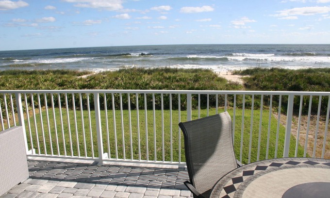 Palm Coast House | Oceanfront Executive Home with private beach and backyard dunes.