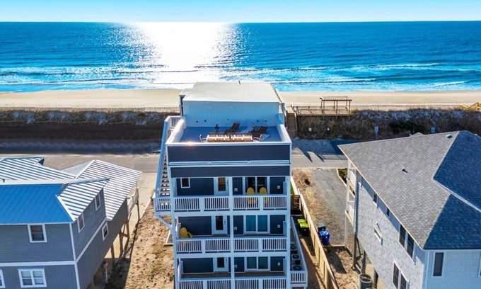 Surf City House | 🏖️ Oceanfront Fun House w/Hot Tub, Heated Pool, EV⚡, Elevator & Game Room 🌅