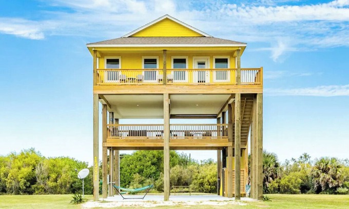 Port Bolivar House | Oceanfront Serene Coastal Escape in Crystal Beach, TX: Yellow Daisy by the Sea