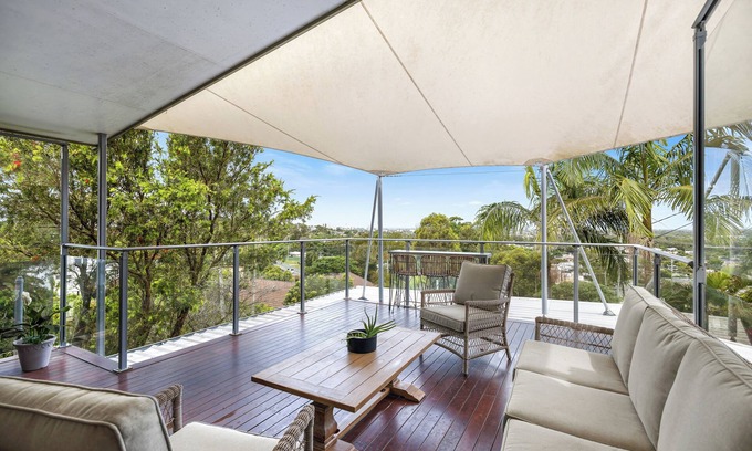 Alexandra Headland House | Oceanview family oasis 900m from beach with pool, kitchen & games room