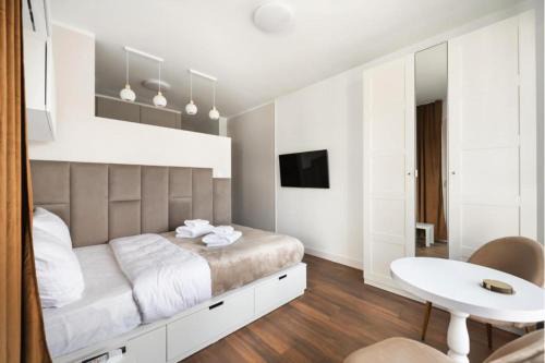 Warsaw Apartment | Okęcie Studios Nowy Służewiec 21 by SuperApart