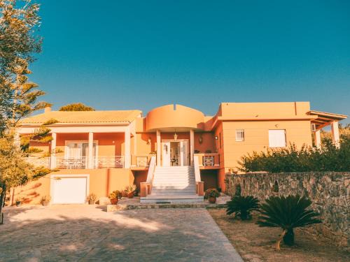Akrotiri Villa | Olas y olivos