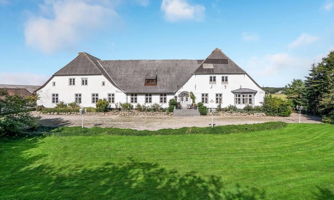 Tonder House | Older property in a rural setting with views of the water tower in Tønder.