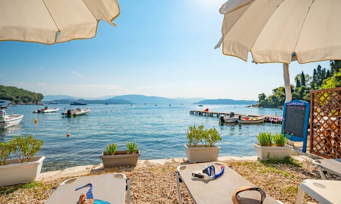 Agni Apartment | Olgas Cottage - on Agni Beach, offering stunning views and tranquility