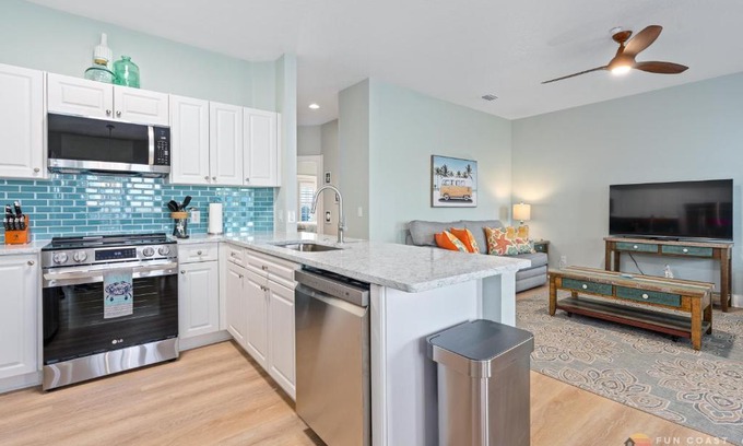 New Smyrna Beach Apartment | ON Flagler Avenue! Dog Friendly with Balcony and Parking Walk to the Beach!