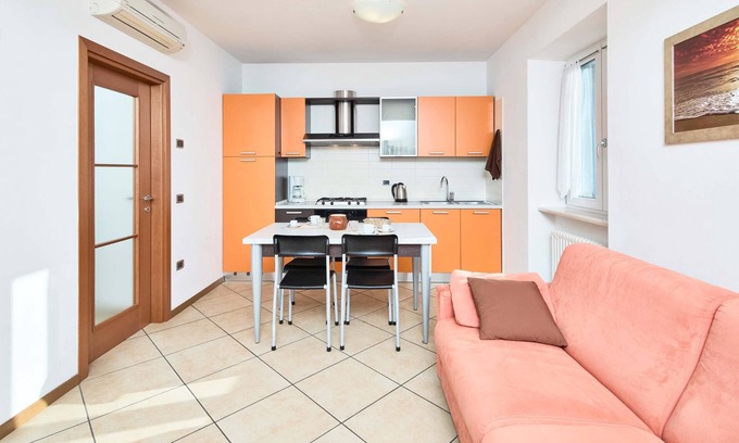 Riva del Garda Apartment | One-Bedroom Apartment with Balcony and Garden View (BV6)