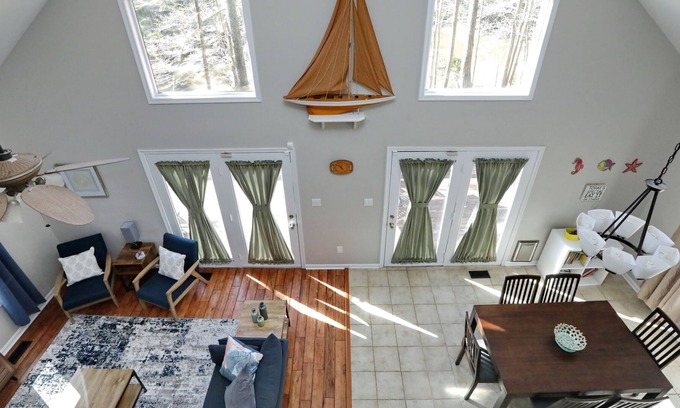 Chesapeake Ranch Estates-Drum Point House | One of a kind waterfront house with pond/creek, deck, privacy and beach access.