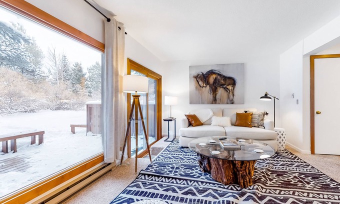 Jackson Hole Condo | Open and inviting, two-story condo with full kitchen, patio, and wildlife views
