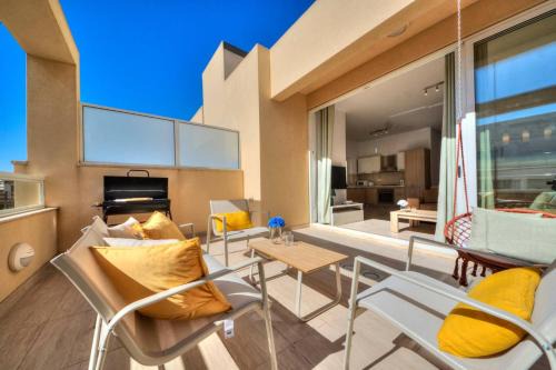Swieqi Apartment | Ortigia Penthouse, Private Terrace with BBQ, Distant Sea Views by Haven & Keys Malta