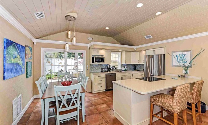 Holmes Beach Villa | Pair of beach cottages with heated pool & convenient access Near the beach