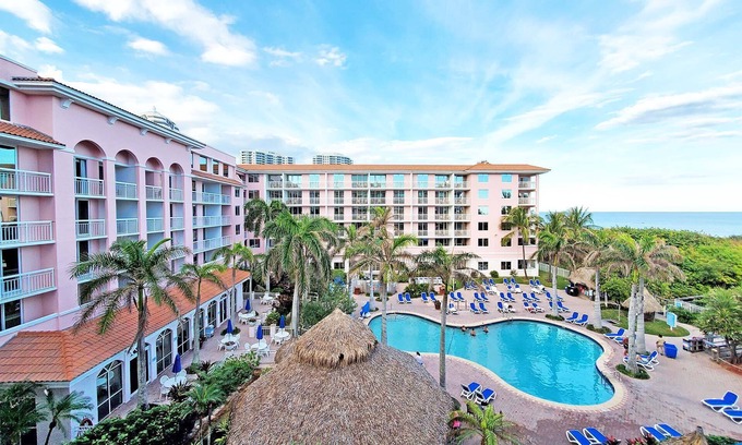 Palm Beach Shores Condo | Palm Beach Shores Resort - Comfortable King Bed - Private Beach