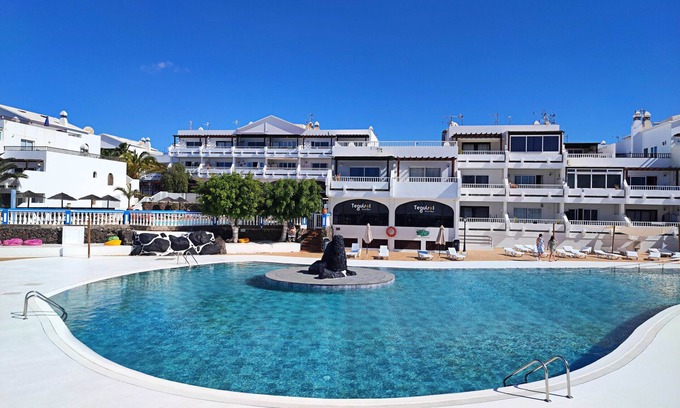 Costa Teguise Apartment | Palmeras Apt - Pool & Terrace - next to Beach