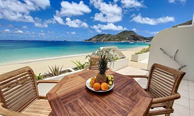 Grand Case Condo | Paradis Caraibes 1, feet in the water in Grand Case