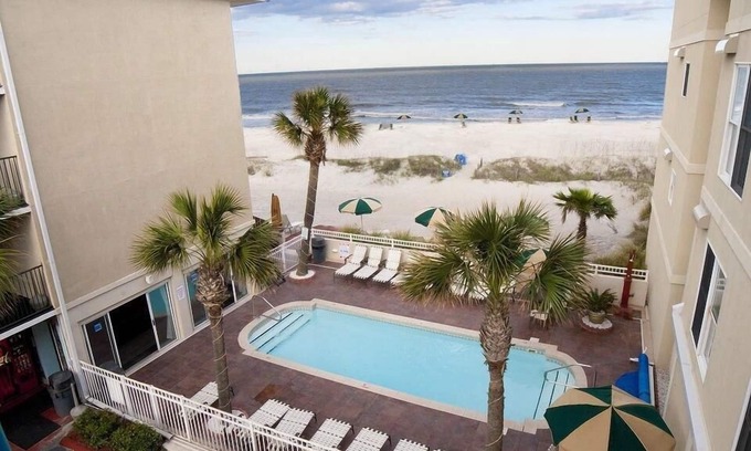 Tybee Island Hotel | Partial Ocean View Room w/Free WiFi, Private Balcony, & Walk-In Shower