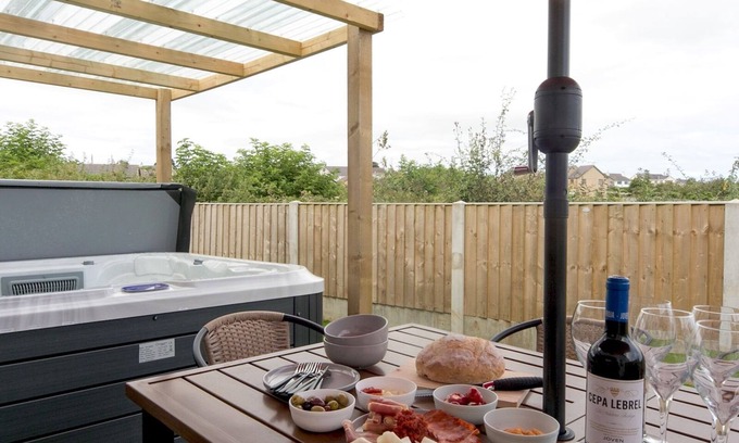 Brynteg House | Pass the Keys | Modern Home with Hot Tub