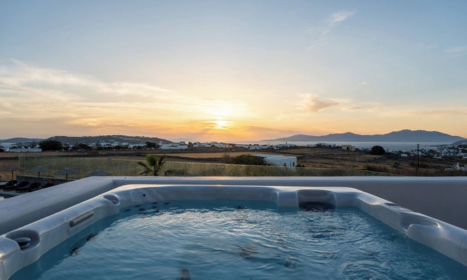 Paraga Apartment | Penthouse Suite with Breakfast at Regency Sunset Suites | Suite E (epsilon)