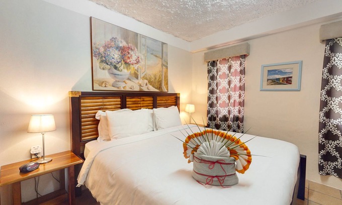 San Pedro Apartment | Perfectly located apartment w/WiFi, AC, shared garden/pool - steps to seashore