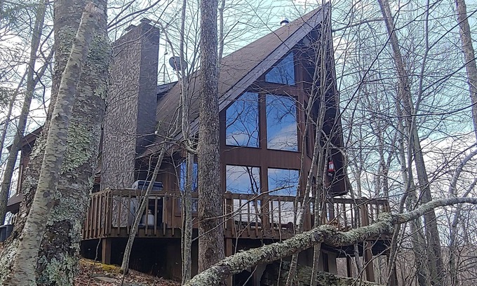 Cresco House | Pocono Private lake setting with, Hot Tub, boat dock, fishing, Swimming, Canoe
