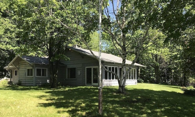 East Jordan Cottage | Porter Estates Big Cabin is a private lake front cottage.