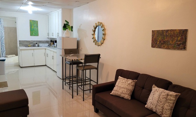 Woodbrook Apartment | (POS) New Town charm steps away from carnival center, dining, club, the Savanah