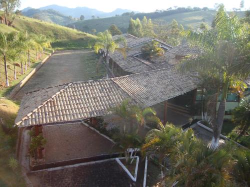 Camanducaia Hotel | Pousada das Palmeiras