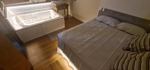 Itaunas Other | Pousada Dunas - Suítes com HIDROMASSAGEM no coração da Vila