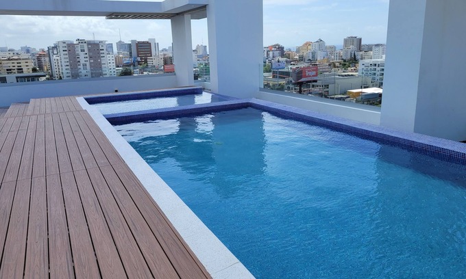 Ensanche Quisqueya Apartment | Precioso apartamento completo y moderno. Piscina, Gym, Area social.
