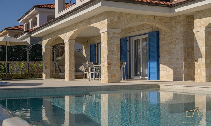 Sveti Vid-Miholjice Apartment | Premium apartment Loma Four with a pool and garden on Krk