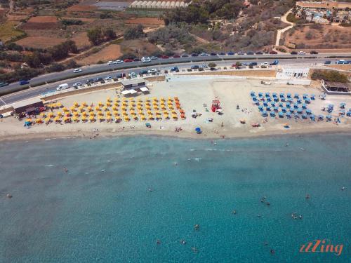 Għadira Apartment | Pretty Beachfront Penthouse in Mellieha