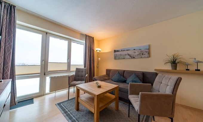 Schillig Apartment | Pretty maisonette vacation apartment with balcony and great view of the North Sea -