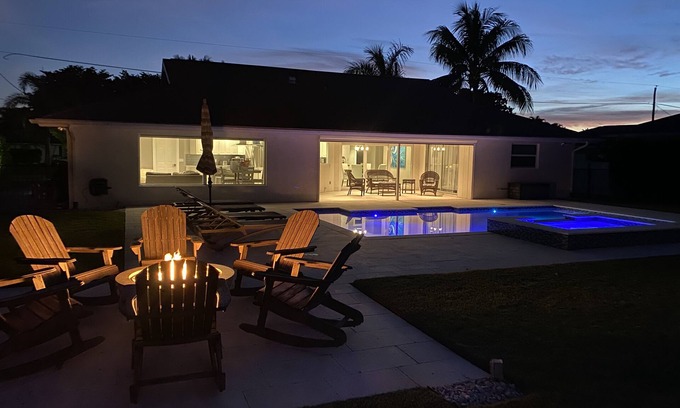Palm River Estates House | Pristine Lake Home, Heated Pool, Gas Fire Pit, Fenced Yard