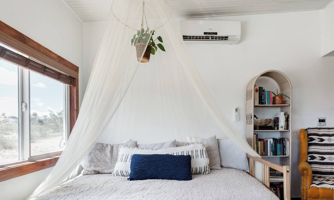 Yucca Valley Cottage | Private desert cabin with hot tub & breathtaking views near Joshua Tree. Relax under starry skies, cook in the spacious kitchen, or explore nearby Pioneertown, La Copine, and endless desert trails.
