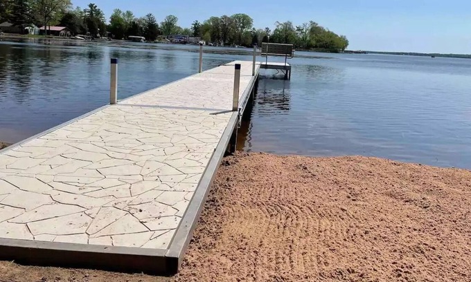 Shawano Cottage | Private Dock, Private Sand Beach and Shawano Lake's Only Boathouse Bar with a TV