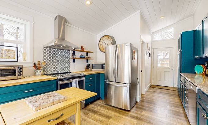 Bend House | Private dog-friendly adventure home with wood stove, open layout, grill, & AC