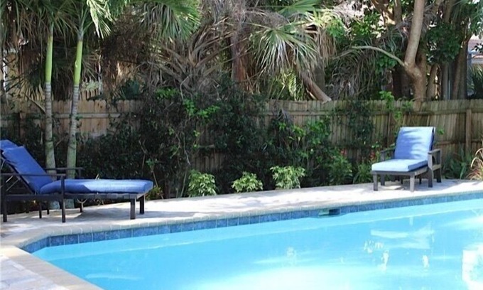 Naples Park House | Private, fenced-in pool, Morning Coffee on the porch and easy mile to the beach.