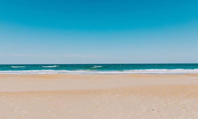 Kill Devil Hills Condo | Professionally Designed Oasis, Budget & Pup Friendly, Walk-in Shower, Pools!