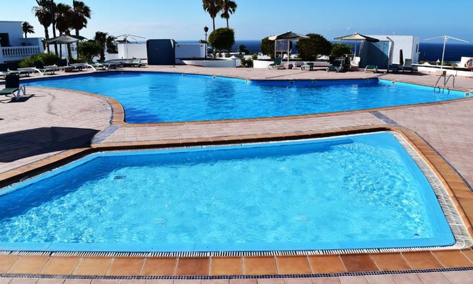 Los Mojones Apartment | Puerto del Carmen center - New Apartment by the pool and private parking