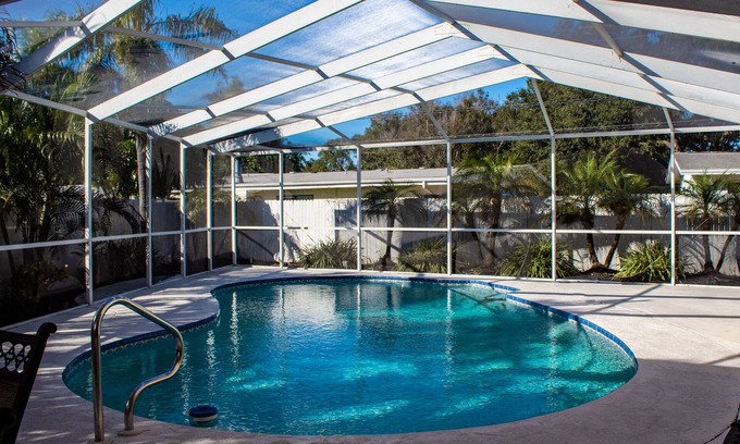 Largo House | Quiet home with Salt Water Heated Pool, next to Largo Golf Course & IRB!