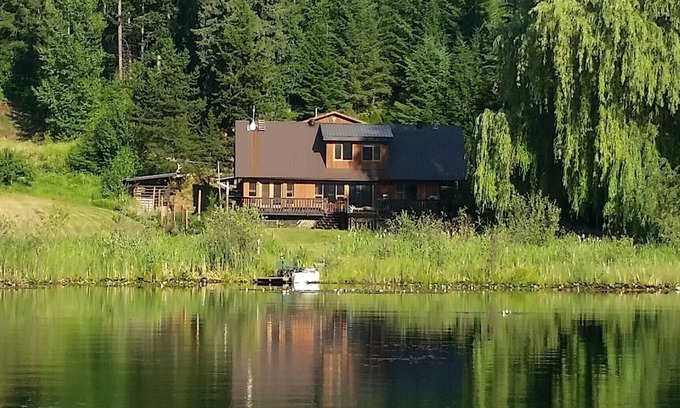 Clearwater House | Quiet Lake Front House with great view. Large deck and yard with its own dock!