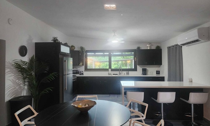 Mameyes II House | Rainforest Serenity Home- Charming 3-bedroom home in Río Grande, WiFi, AC & Pool