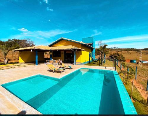 Guape House | Rancho Ipê Amarelo - Capitólio - MG