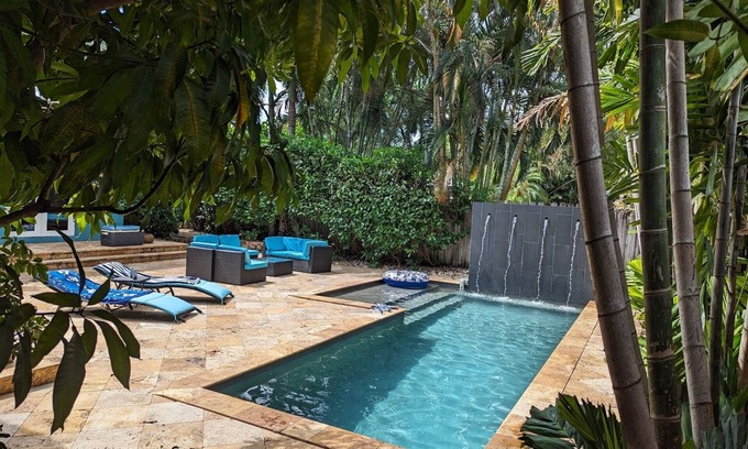 Poinsettia Heights House | Rated top 5% of homes. 3BR 3BA Private Oasis Home with Heated Salt Water Pool.