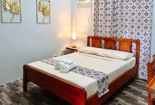 Mambajao Hotel | RedDoorz at Gracia's Calzada Inn Camiguin