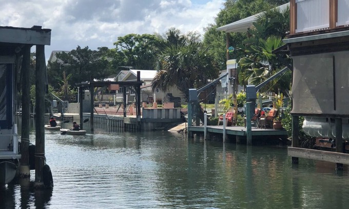 Indian Harbor Estates House | Reel Paradise Cottage- Canal Front- Bring your Boat to our 50’ Dock!
