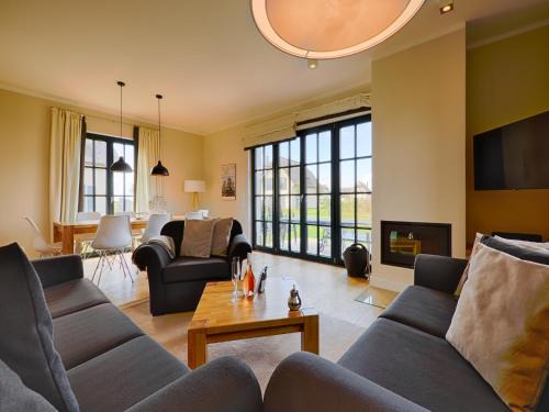 Kreptitz House | Reetland am Meer - Luxus Reetdachvilla mit 3 Schlafzimmern, Sauna und Kamin F08