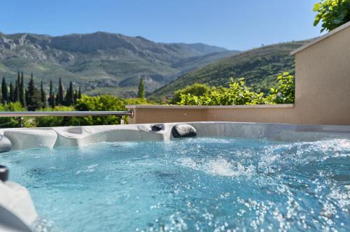 Srinjine Apartment | RELAX apartment Split area with private jacuzzi on terrace with mountain view