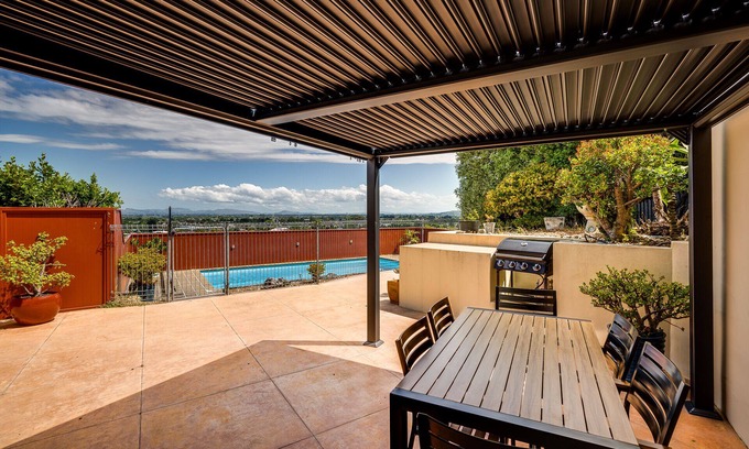 Hospital Hill House | Relax At Poolside - Napier Holiday Home
