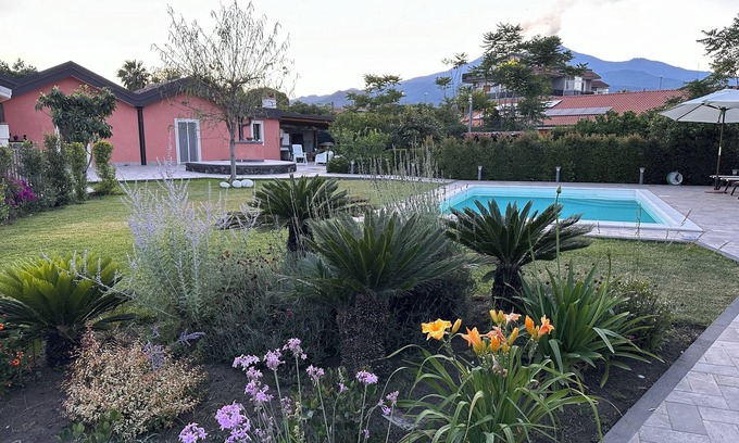 Aci Sant'Antonio Villa | Relax in this house with garden, pool, conveniently located